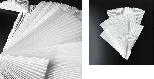 Layered paper composition mixing handcrafted folds and graphic shapes