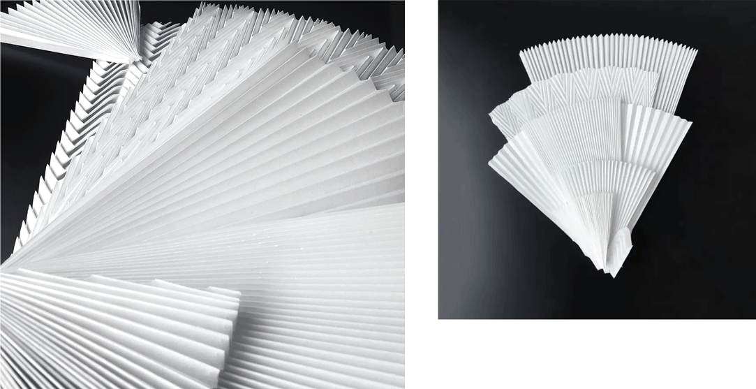 Plissé paper sculpture by Studio Marianne Guély captured in a cinematic closeup