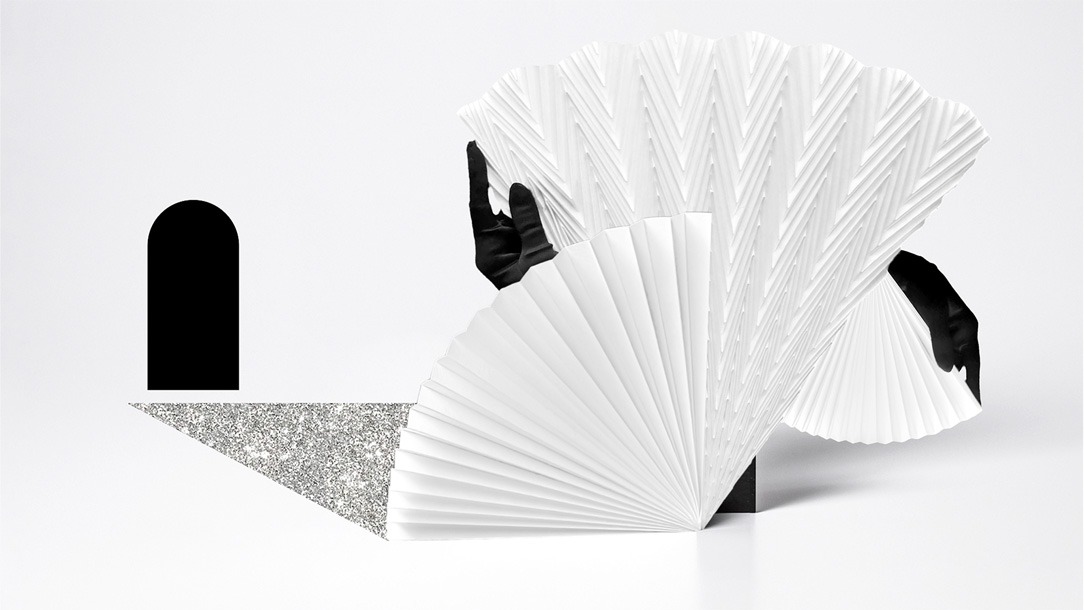 Stylised paper silhouette integrated into an atmospheric collage