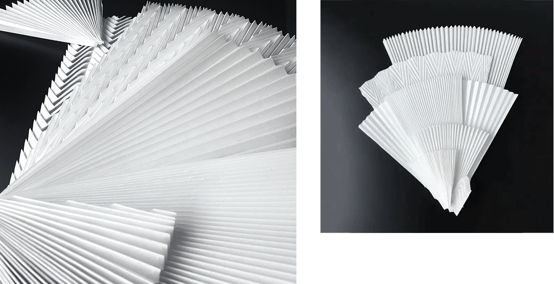 Plissé paper sculpture by Studio Marianne Guély captured in a cinematic closeup