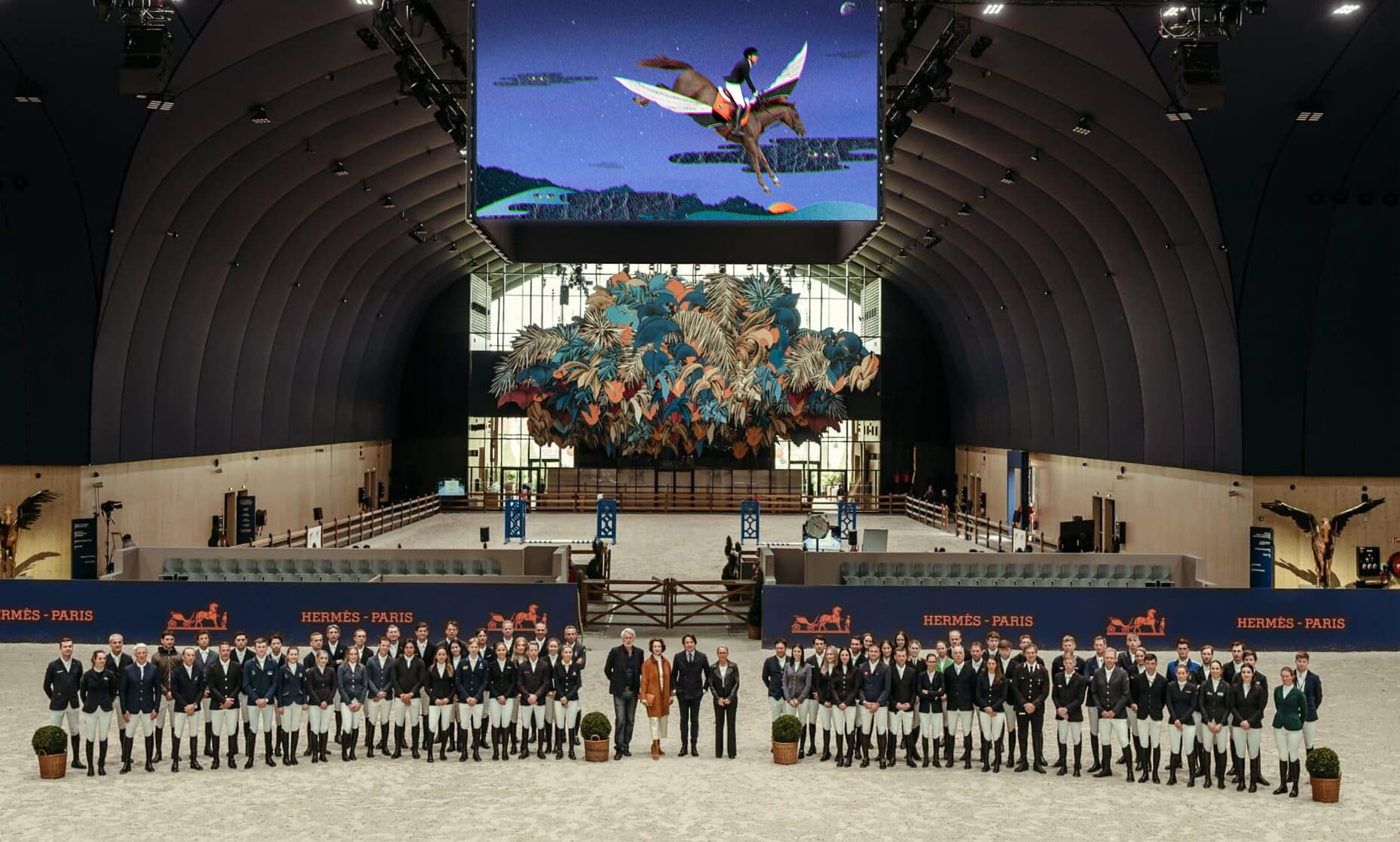 collage detail with layered paper textures around horse and rider