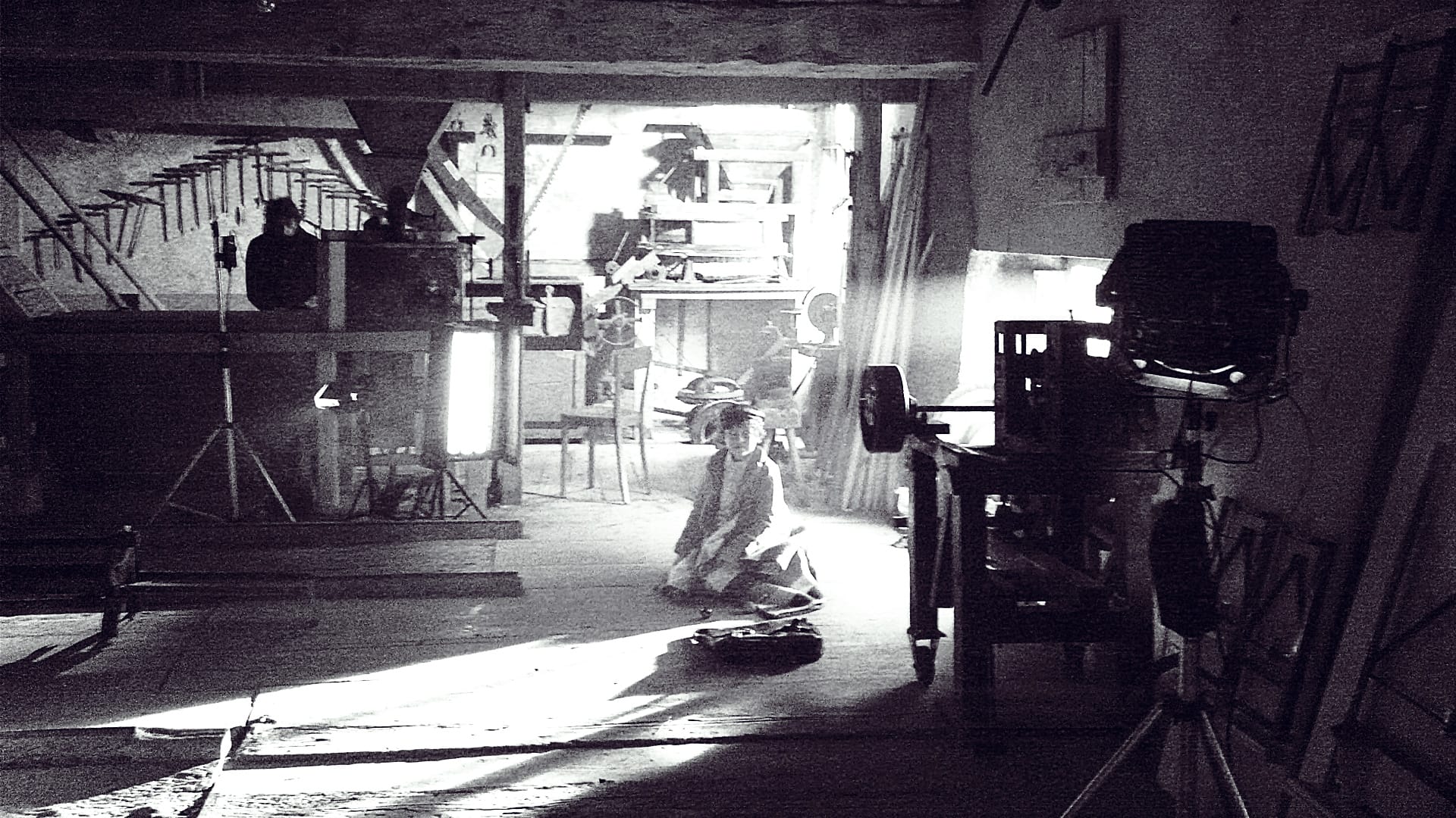 Behind-the-scenes image shot inside an old Swiss mill during the Jaeger-LeCoultre history film production